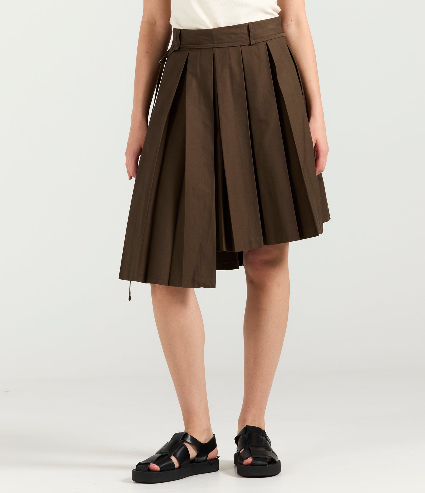 PLEATED ASYMMETRIC SKIRT