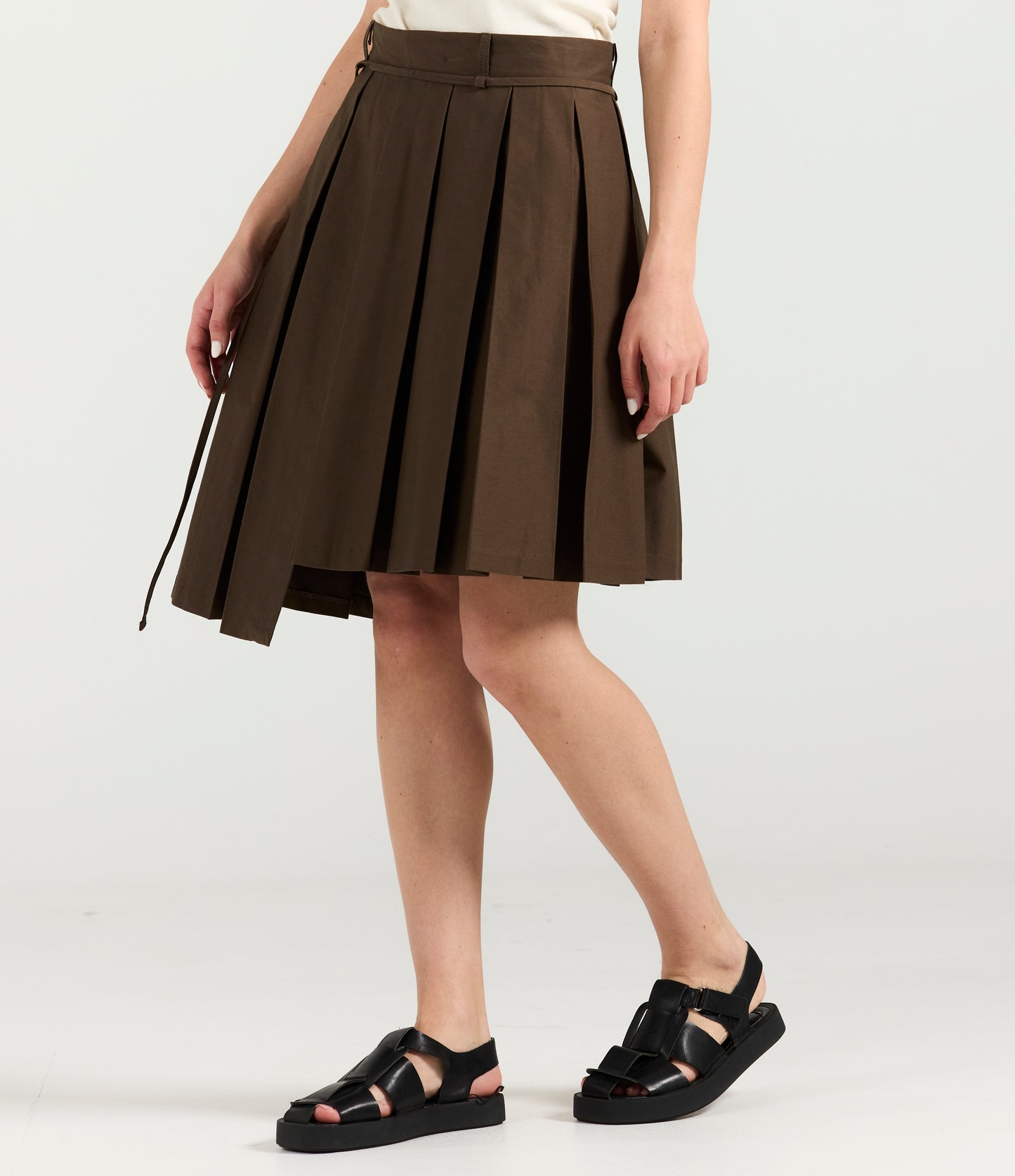 PLEATED ASYMMETRIC SKIRT