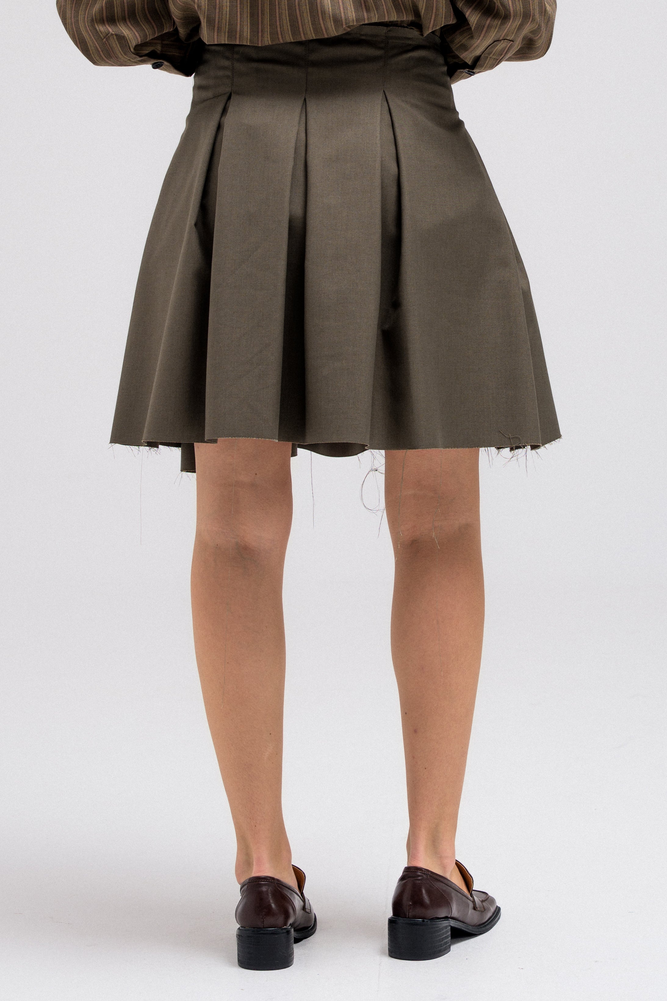 RAW PLEAT SKIRT